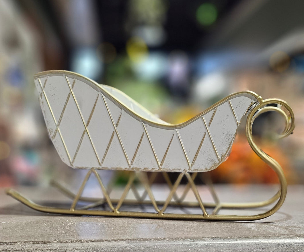 White and Gold Metal Sleigh